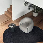 Calligaris Haven Lounge Stol – polstret loungestol med drejefod, bløde afrundede former og omfavnende armlæn.