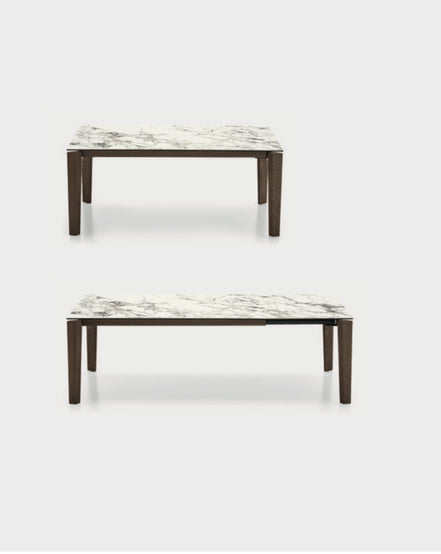 Calligaris DOGMA Udtrækkeligt Spisebord – elegant rektangulær form med solid træfod, designet af Archirivolto