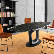 Calligaris ORBITAL – udtrækkeligt spisebord med oval form og central fod, designet af Pininfarina  ￼